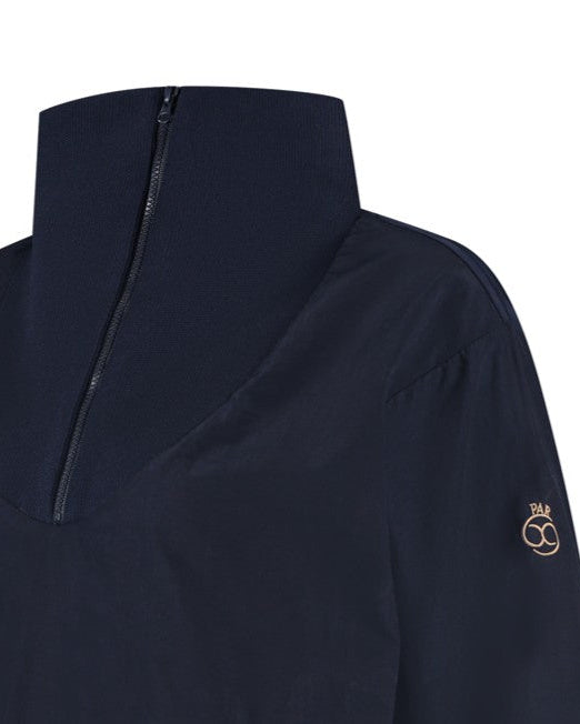 Navy blue jacket with a brand logo on the sleeve against a white background