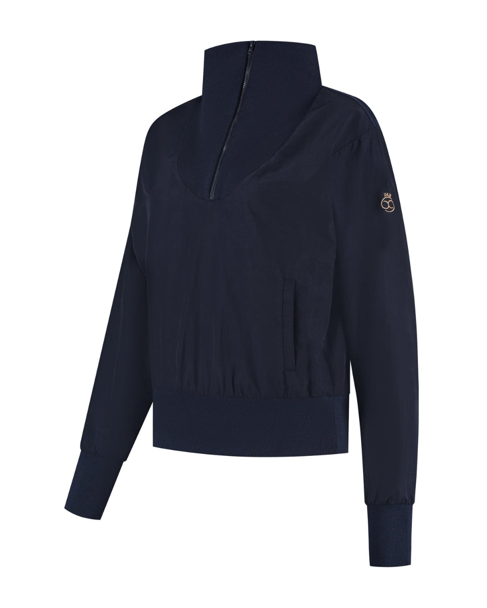 Navy blue jacket with a brand logo on the sleeve against a white background